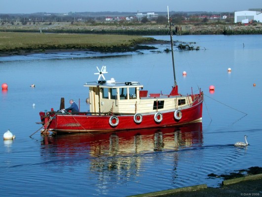 Messing about on the river
The River Irvine and River Garnock both meet at Irvine harbour before making there way the short distance out to Irvine Bay.  The boat here is on the Irvine.  [url=http://www.multimap.com/map/browse.cgi?lat=55.6078&lon=-4.6897&scale=25000&icon=x/]Map location[/url]
