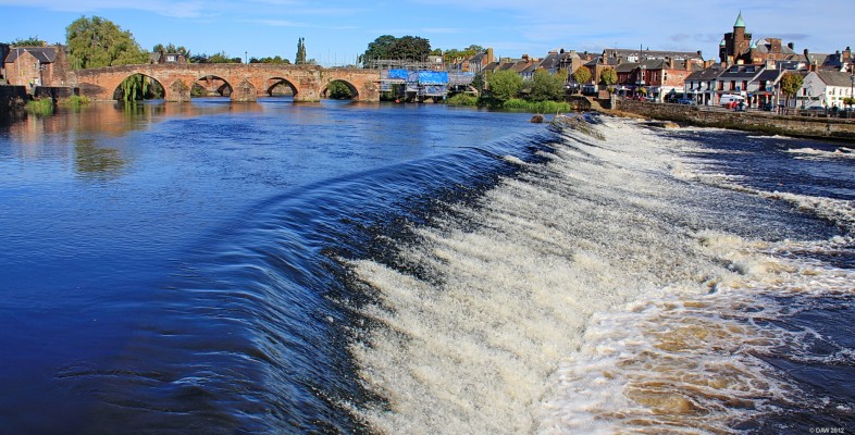 The river Nith, Dumfries
Looking over to the whitesands area of Dumfries.  This area has flooded many times during winter storms since the river is tidal up to this weir.  The Dervorguilla, or old bridge, is the background. [url=http://www.streetmap.co.uk/map.srf?X=296970&Y=575922&A=Y&Z=115/] Map location. [/url]
