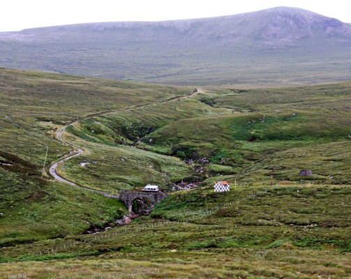 The road to Cape Wrath
To get to Cape Wrath you need to get the small passenger ferry over from Keoldale and then either take the mini bus you see here or walk the 11 miles to the lighthouse.  Part of the journey goes through the MoD live fire training area at Cape Wrath, on days when the range is in use the guard post seen in the photo is manned.  [url=http://streetmap.co.uk/map.srf?X=232057&Y=969957&A=Y&Z=120/] Map location. [/url]

