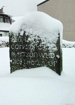 Robertson Gravestone, Neilston Parish Church grave yard
Snow gives brief clarity to the carvings on this grave stone in the church grave yard.
