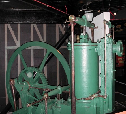 The Robertson Marine Steam Engine
Anyone familiar with the monument on the high street in Neilston might recognise this engine.  It is a replica of the 3hp modified beam engine of John Robertson's design that was used to power the Clyde first steam ship, the Comet in 1811. This example can be seen at the [url=http://www.scottishmaritimemuseum.org/] Scottish Maritime Museum [/url] at Braehead, I believe the originall is in the science museum in London.
