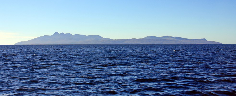 The Island of Rum
Rum is the largest of the Small Isles but is inhabited by only a few dozan people.  The highest peak is Askival at 812m.  This view is taken from Loch Scavaig, some 15km away.  [url=http://www.streetmap.co.uk/map.srf?X=146359&Y=809172&A=Y&Z=130&ax=150399&ay=815332/] Map location. [/url]
