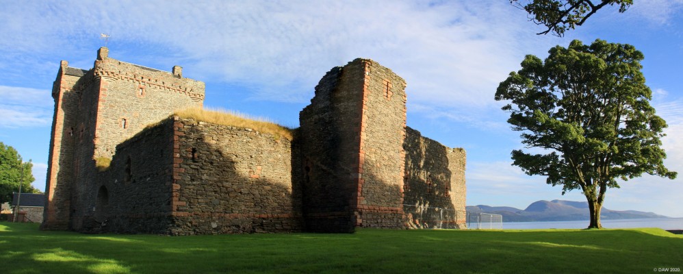 Evening sun on Skipness Castle
The first castle here was built around 1200 by Clan McSween although it has had a great deal added since then.  It later became the stronghold of the MacDonalds and much of what you see dates from their reconstruction around 1300 including the curtain wall you see here.  The Island of Arran can be seen in the background. [url=http://streetmap.co.uk/map.srf?X=190780&Y=657775&A=Y&Z=120/] Map location. [/url]
