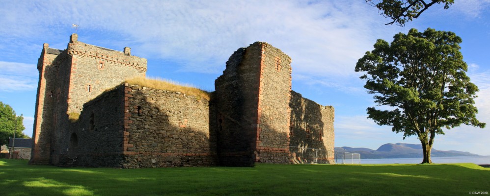 Evening sun on Skipness Castle
The first castle here was built around 1200 by Clan McSween although it has had a great deal added since then.  It later became the stronghold of the MacDonalds and much of what you see dates from their reconstruction around 1300 including the curtain wall you see here.  The Island of Arran can be seen in the background. [url=http://streetmap.co.uk/map.srf?X=190780&Y=657775&A=Y&Z=120/] Map location. [/url]

