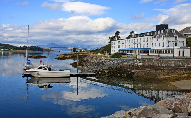 The old ferry slipway, Kyle of Lochalsh
The slipway on the right was used by a ferry service to the Isle of Skye from around 1600 until 1995 when the bridge you see in the distance was opened.  For those who prefer the more romantic sea crossing you can still go by boat from Mallaig all year round and Glenelg in the summer. 
