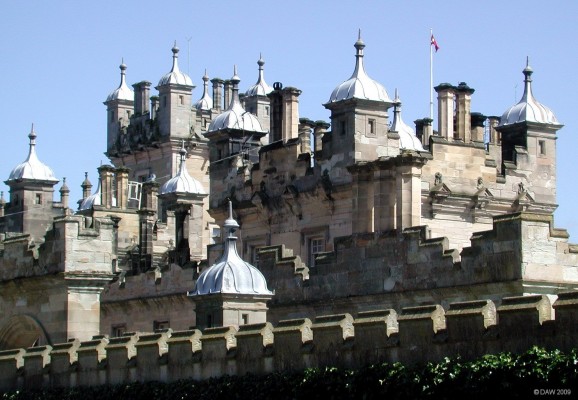 Spires of Floors Castle, Kelso
Built in 1721 but later remodeled between 1837 and 1847 by William Playfair.  He apparently drew his inspirations from the highly ornamented style of Heriots Hospital in Edinburgh.  [url=http://www.streetmap.co.uk/map.srf?X=370970&Y=634637&A=Y&Z=120/] Map location. [/url]
