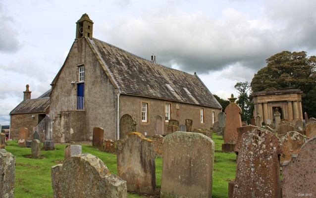 St Quivox Church, Auchencruive
A church of some kind has stood here since around the 12th century.  Its name has changed several times, the original name being Sanchar-in-Kyle. In 1595 the church was restored by Lord Cathcart, the owner of Auchincruive Estate, other additions to the building were made in the 18th and 19th century.  The Maausoleum on the right was built in 1822 by the Campbells of Craigie. [url=http://www.streetmap.co.uk/map.srf?X=237496&Y=624045&A=Y&Z=115/] Map location. [/url]
