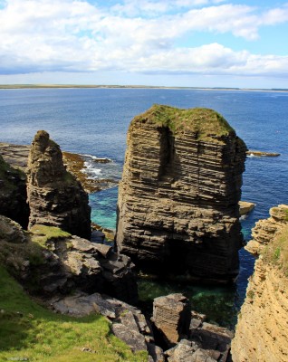 Sea stacks, Noss head, Caithness
Looking across Sinclair's Bay from near Sinclairs Castle.  [url=http://streetmap.co.uk/map.srf?X=337794&Y=954903&A=Y&Z=115/] Map location. [/url]
