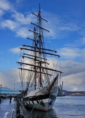 Stavros S Niarchos
The 60m Tall Ship paying a winter visit to Greenock in early 2015.  The ship was launched in 2000 from Appledrore Shipyard in England as a "modern" sailing ship with engines as well as sails.  At the time this photo was taken she was operated by the Tall Ships Trust.  She has since been sold and now sails under the name of Sunset.
