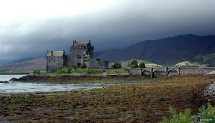 Storm clouds over Eilean Donan Castle
Eilean Donan Castle sits on an island where Loch Alsh and Loch Duich meet.  It never looks the same on any consecutive day and I make no excuse for the plethora of pictures of it in this gallery :-)  All the pictures in this gallery were taken over about 4 consecutive days in 2002.
