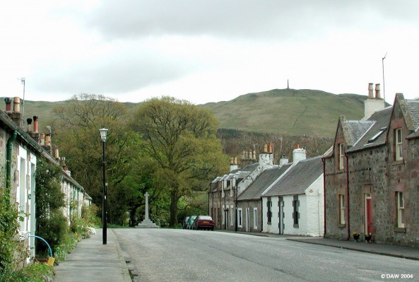 The Village of Straiton
A view down the main street with Craigenpower hill and monument in the background.  
