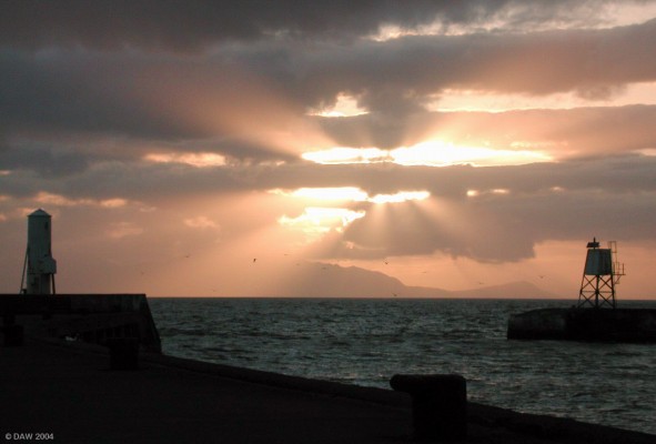 Sunset at Ayr Harbour looking towards the Isle of Arran
