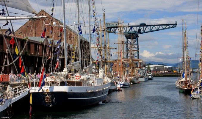 Tall Ships, James Watt Dock, Greenock 2011
Looking West along James Watt dock in Greenock during the 2011 Tall Ships event.  This dock is now being transformed into a Marina but the mighty Titan Crane still stands proud in the background telling a story of days gone by when it could lift as much as 200 ton loads onto awaiting ships.
