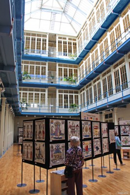 The Scottish Diaspora Tapestry, Anchor Mill, Paisley 2014
The Diaspora tapestry consists of more than 300 embroidered panels depicting the people and places that connect Scotland to the rest of the world.  The panels were embroidered in 34 different countries.   Some of the panels are seen here during an exhibition in the Atrium of Paisley's Anchor Mill in 2014.

