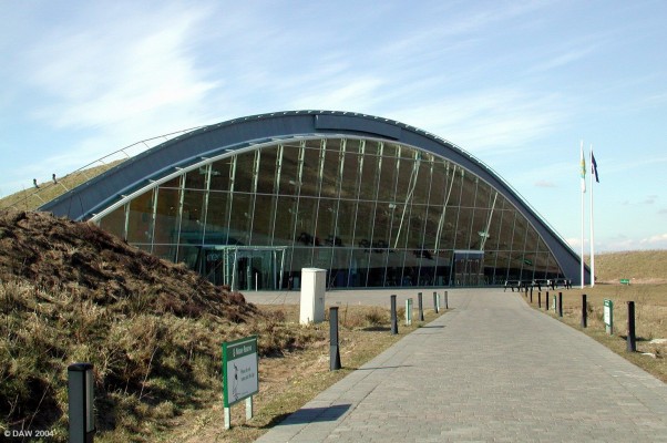 The Big Idea, Irvine
Funded under the Millenium project it was designed as a tourist attractiion.  Its theme was invention and design with hands-on models for children.  Unfortunately simple economics meant it turned into a bad idea and closed in 2003.  Irvine is now left with this impressive grass covered concrete and glass epitaph.
