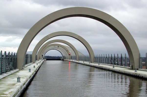 Looking along the aquaduct towards the top caisson of the Falkirk Wheel
The aquaduct emerges from a tunnel that was built underneath the Antonine Wall.  This was the first Canal tunnel built in the UK for 100 years. 
