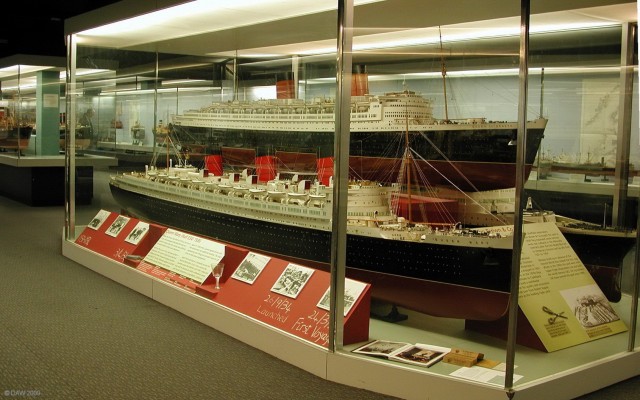 The Clyde built Queens, Transport Museum, Glasgow
Its rather sad that all that remains of the great Cunard liners built on the Clyde are memories and some ship yard models.  The ships are the Queen Elizatheth I on top, the Queen Mary below and you can just see the bow of the Queen Elizabeth II behind the QM.  The QM is at Long beach CA, the QE1 caught fire in Hong Kong harbour (after it had been retired) and was scrapped and the QE2 has just recently been retired to Dubia as a floating Hotel.
