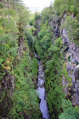 The Corrieshalloch Gorge
As box canyons go its perhaps not the worlds most spectacular but its almost certainly the best example you'll see in the British Isles.  The Gorge is a mile long and 61m (200ft) deep with the falls of Measach dropping some 150ft at one end.  This photo was taken from the suspension bridge that crosses the gorge near the water fall. [url=http://www.streetmap.co.uk/map.srf?X=220340&Y=878020&A=Y&Z=120/] Map location. [/url]
