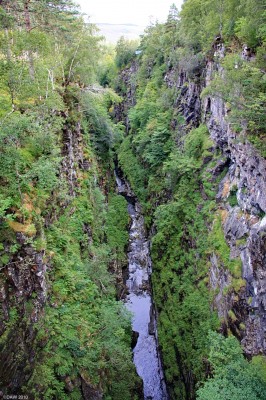 The Corrieshalloch Gorge
As box canyons go its perhaps not the worlds most spectacular but its almost certainly the best example you'll see in the British Isles.  The Gorge is a mile long and 61m (200ft) deep with the falls of Measach dropping some 150ft at one end.  This photo was taken from the suspension bridge that crosses the gorge near the water fall. [url=http://www.streetmap.co.uk/map.srf?X=220340&Y=878020&A=Y&Z=120/] Map location. [/url]
