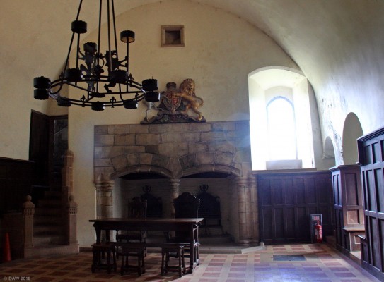 The Lords Hall, Doune Castle
The panelling and floor tiles in this room date from the restoration of the 1880s.  The roof is vaulted and as can be seen there is an unusual double fireplace.
