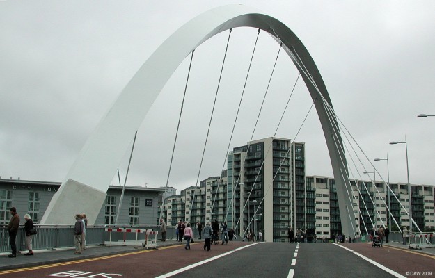 The Squinty Bridge, River Clyde, Glasgow
A view of the Clyde Arc Bridge taken a few days before it was opened to road traffic in September 2006.  Looking from the south side over to Finnieston. The total bridge span is 169m with a width of 22m, the highest point of the Arch is 32m and the actual span of the arch is 96m.  [url=http://www.streetmap.co.uk/map.srf?X=257177&Y=664982&A=Y&Z=115/] Map location. [/url]
