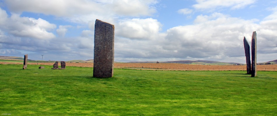 The Standing Stones of Stenness, Orkney
The enormous Stones of Stenness are all that remains of a great stone circle on an ancient ceremonial site. Stenness today consists of four upright stones up to 6m in height in a circle that originally held 12 stones. The stones were encircled by a large ditch and bank and this may be the oldest henge in the British Isles. [url=http://streetmap.co.uk/map?X=330780&Y=1012527&A=Y&Z=120/] Map location. [/url]
