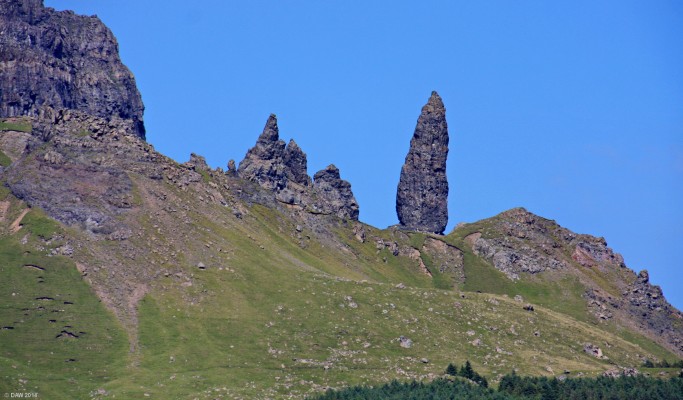 The old man of Storr
This pinnacle is the largest of several around The Storr, it rises to some 160ft, the small dots at the base are people.  There are many folklores about the rock but my favourite is that it is the thumb of a giant who died and was buried by the earth. [url=http://streetmap.co.uk/map.srf?X=149937&Y=851650&A=Y&Z=120/] Map location. [/url]
