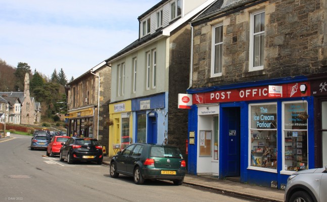 The main street, Tighnabruaich
I suspect the only thing that will have changed in this view in the last 100 years are the shop owners and the cars. [url=http://streetmap.co.uk/map?X=197969&Y=672821&A=Y&Z=115/] Map location. [/url]
