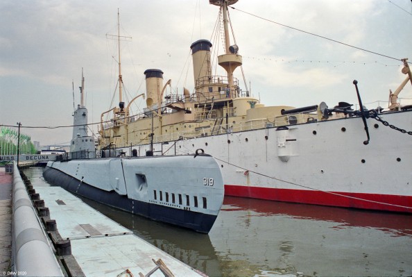 USS Becuna, Penns Landing, Philadelphia 1989
The former Second WOrld War submarine with the USS Olumpia behind at the Independence Seaport Museum.  Becuna in 1944 and served until 1969 operating in the Pacific, Atlantic and Mediterranian.  She apparently even has one cruise to Scotland.
