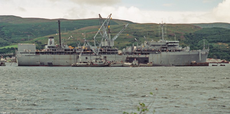USS Simon Lake, Holy Loch, late 1980s
The USS Simon Lake (AS33) was a Submarine Tender of the US Navy, launched in 1964, she served as a support vessel for the US Navy's Polaris Missile Submarines. She is pictured here some time between 1987 and 1992 in the Holy Loch on the Clyde. From 1964 until 1992 the US Navy had a permanent presence in the Holy Loch. The Simon Lake was the last ship to be based there. 
