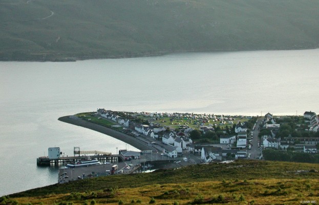 Ullapool as seen from the Braes of Ullapool
The last rays of the evening sun illuminate the camp site at Ullapool.  [url=http://www.multimap.com/map/browse.cgi?lat=57.8968&lon=-5.1357&scale=25000&icon=x/]Map location[/url]
