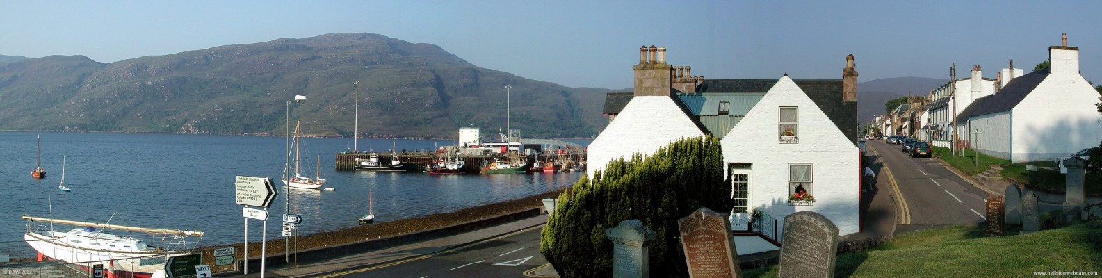 A view of Ullapool from the old graveyard
Prince Charlie is said to have hidden here, but then I expect he hid in a lot of places.  [url=http://www.multimap.com/map/browse.cgi?lat=57.8969&lon=-5.1543&scale=25000&icon=x/]Map location[/url]
