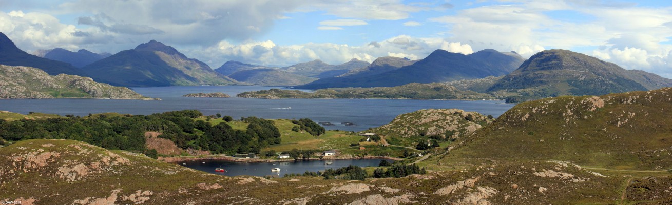 Upper Loch Torridon and Loch Sheildaig
Looking across Loch Shieldaig. left of centre is the opening in to Upper Loch Torridon, you just can just make out the village of Torridon in the distance.  Closer, on the right is the village Shieldaig.  The small boat in the centre of the photo will almost certainly be the Torridon Sea Tours boat heading back to Shieldaig.  [url=http://streetmap.co.uk/map.srf?X=177205&Y=856162&A=Y&Z=115/] Map location. [/url]
