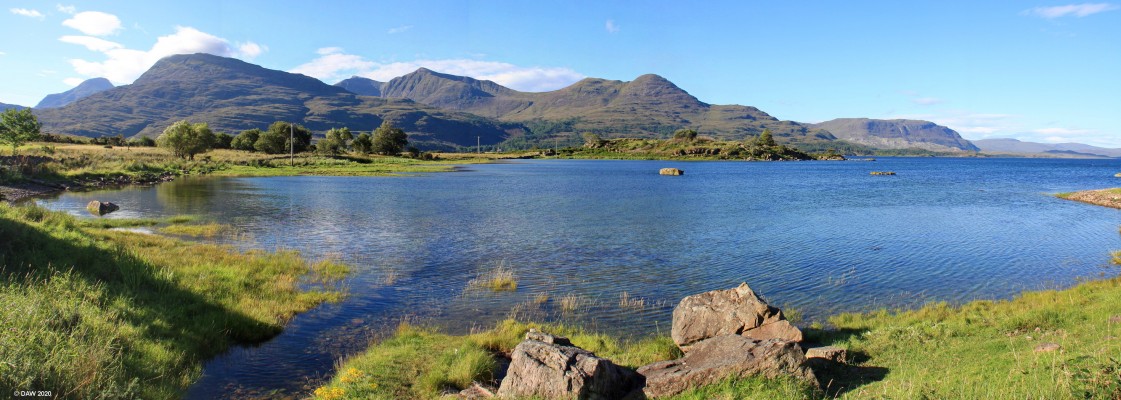Upper Loch Torridon
Looking across Upper Loch Torridon from the western end towards the Ben Damh hills.  People first arrived here some 8,000 years ago but most buildings and ruins you see are not more than 200 years old.  Many homes were abandoned in 1840 when a change in land ownership took away the fields and hill grazings for sheep farming.  The few that stayed eked out a living by the shore. [url=https://streetmap.co.uk/map.srf?X=189568&Y=856306&A=Y&Z=115/] Map location. [/url]
