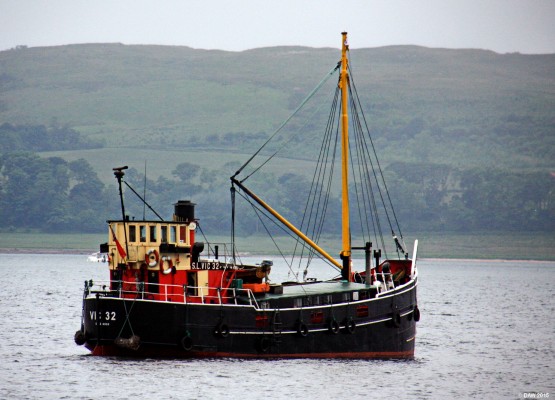 VIC 32, Largs
One of the last sea going "Clyde Puffers" off Largs in 2013.  [url=http://savethepuffer.co.uk/] VIC 32 [/url] was built in 1943 for the Admiralty as a "Victualing Inshore Craft"  but now serves as a cruise boat based at Crinan.
