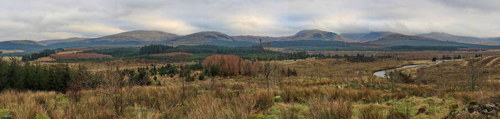 A view from the Straiton to Glentrool road
Sometimes its good to take the long road to places you know and you discover remote countryside like here between Straiton and Glentrool.  The highest distant hill would be Merrick at 843m but its obscured by low cloud. [url=http://www.streetmap.co.uk/map.srf?X=236140&Y=587290&A=Y&Z=126&ax=235700&ay=591170/] Map location. [/url]
