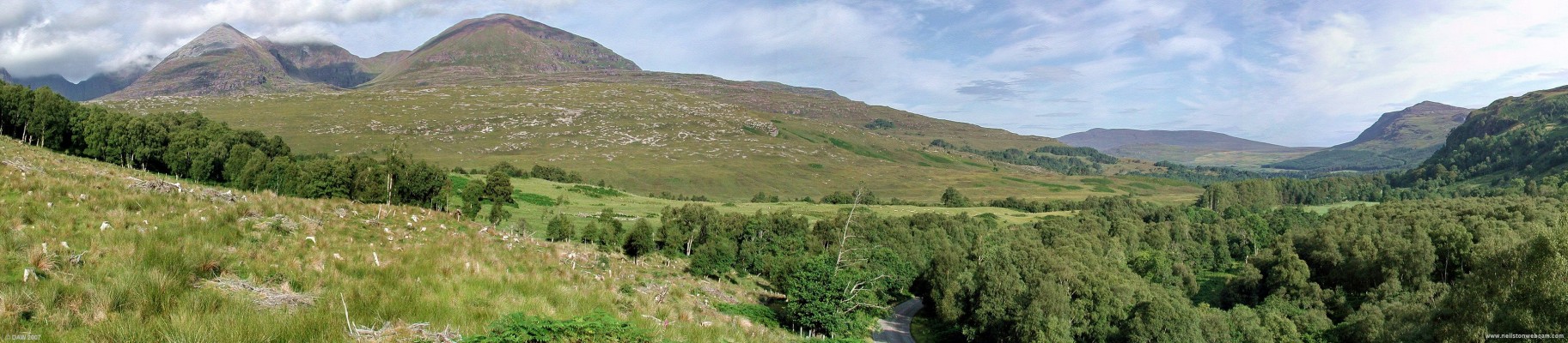 A view of the An Teallach Mountains from near Dundonnell
The distinctive cone peak of Glas Mheall Liath rises to 960m on the left.  Dundonnell is round the hill side out of sight near the end of Little Loch Broom.  [url=www.multimap.com/map/browse.cgi?lat=57.8135&lon=-5.1781&scale=25000&icon=x/]Map location[/url]
