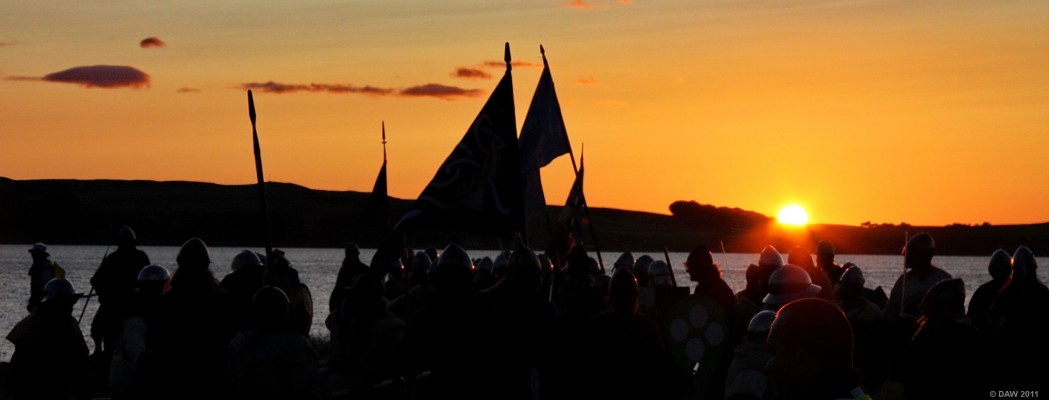 Viking festival 2008, Largs
The setting sun over the Great Cumbrae back lights the Battle of Largs re-enactement at the Pencil monument during the 2008 Viking festival.
