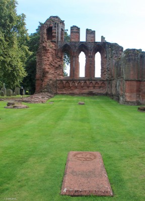 Grave of William the Lion, Arbroath Abbey
William "The Lion" was King of Scots between 1165 and 1214.  A somewhat reckless character who ended up being captured by the English at the Battle of Alnwick.  The term Lion came from his flag, a red Lion on a yellow background, a version of this later went on to become the Royal Banner of Scotland and is still used today.
