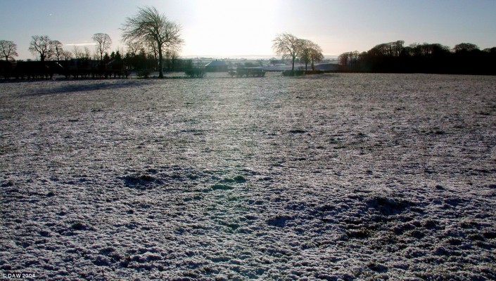 A cold winter morning view near Dunlop
This view is taken looking south from the old switchback road between Neilston and Stewarton.  Dunlop House is located in the trees on the extreme right.
