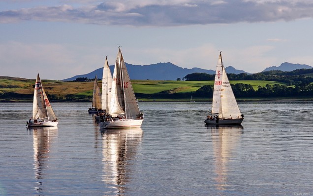 Yachts, Largs
The evening sun catches a group of Yachts off Largs.  The Great Cumbrae is in the background with the mountains of Arran in the distance. [url=http://www.streetmap.co.uk/map.srf?X=220348&Y=658666&A=Y&Z=120/] Map location. [/url]
