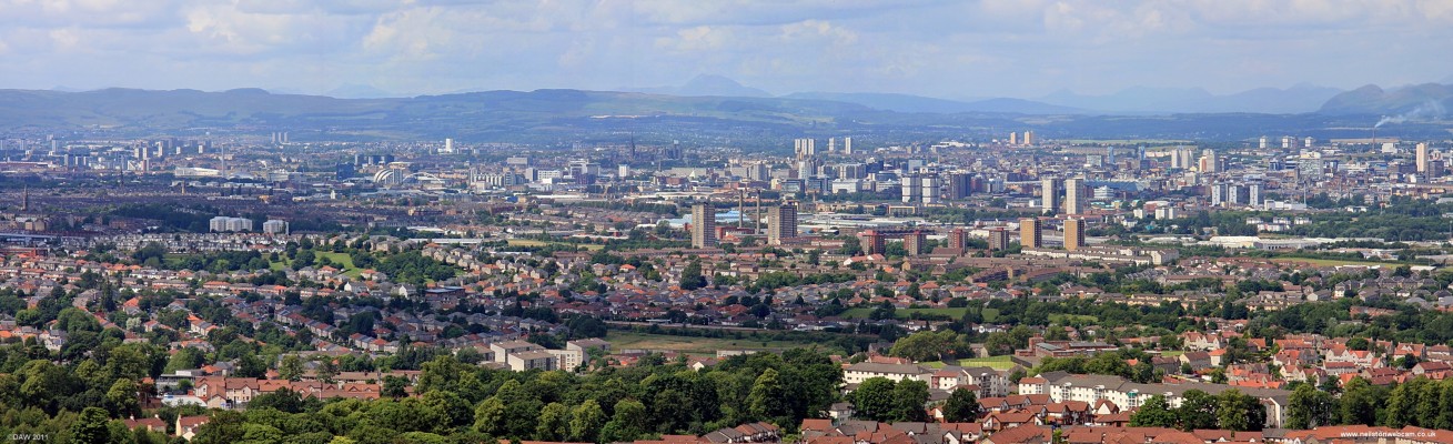 Over looking Castlemilk and Glasgow from the Cathkin Braes, 2009
In the centre on the horizon is the familier shape of Ben Lomond.   Below and to the right a bit  is the Centre of Glasgow with the Arch of the Squinty bridge and the Armadillo on the left. [url=http://www.streetmap.co.uk/map.srf?X=261802&Y=658625&A=Y&Z=120/] Map location. [/url]
