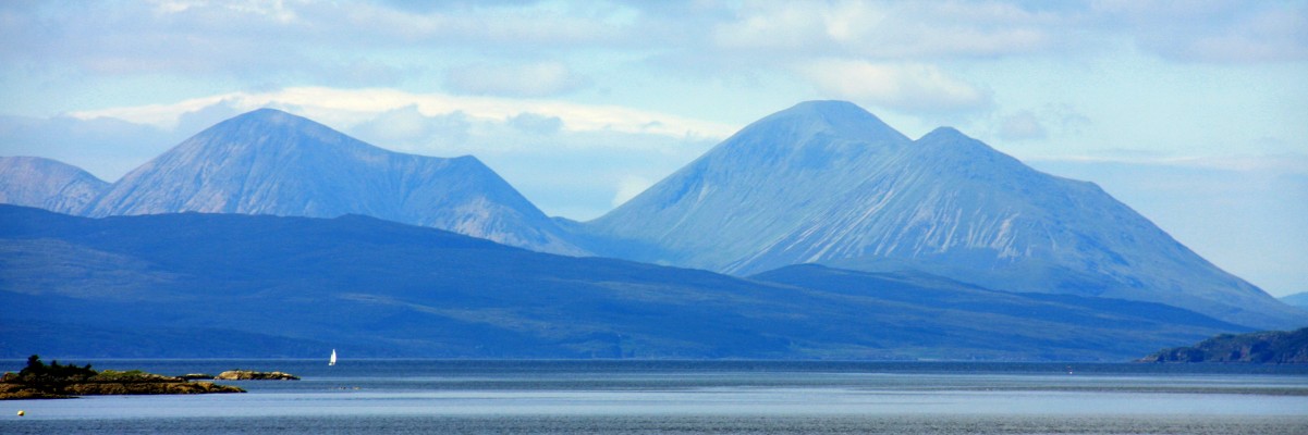 Distant view of Skye from Ardaneaskan
A distant view of the mountains of Skye from Ardaneaskan.  The island of Scalpey is in the foreground.  [url=https://streetmap.co.uk/map.srf?X=183319&Y=835382&A=Y&Z=130/] Map location. [/url]
