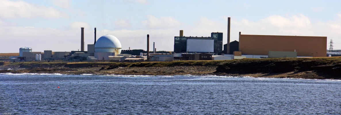 Dounreay from Fresgoe Harbour
A view of the Dounreay Nuclear site from across Sandside bay at Fresgoe Harbour.  Just in front of the old PFR reactor sphere lies the infamous Dounreay shaft where an unknown cocktail of radioactive waste was dumped until in 1977 an explosion inside the shaft lifted off the concrete lid spreading waste around the surrounding area.  At the time the operators played it down but it is now known to be the most serious incident in the history of the site.  
