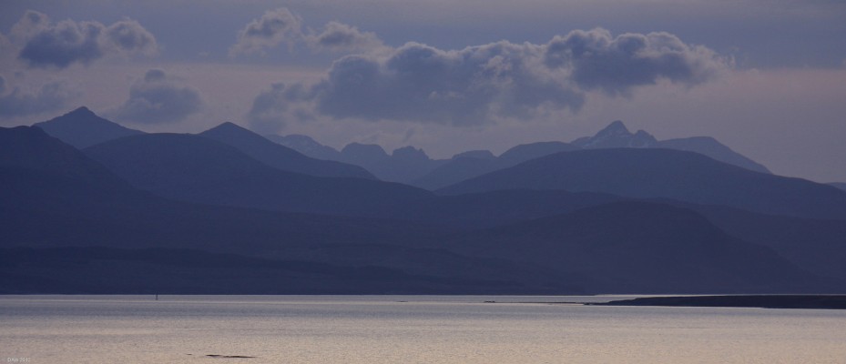The Isle of Skye
A dusk view of Skye from the top of the Skye Bridge. [url=http://www.streetmap.co.uk/map.srf?X=174442&Y=826802&A=Y&Z=120/] Map location. [/url]

