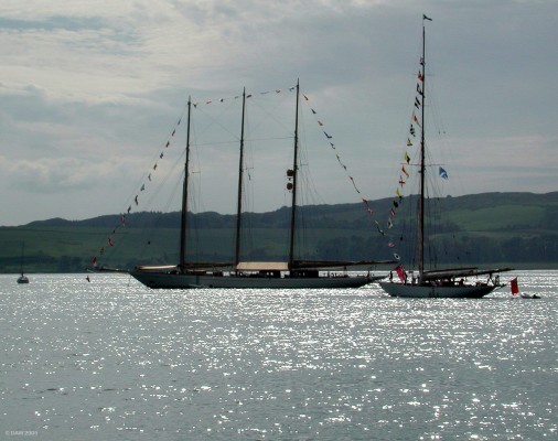 Fife Regatta, 2003
Its not often you see a 3 master Yacht on the Clyde these days.  This was taken at the 2003 Fife Regatta which is a celebration of William Fife III and the Yachts he built at the yard in Fairlie a few miles south of Largs.  Adix is on the left, some 212ft in length with 8 sails, Moonbeam is on the right with a length of about 150ft but is luying at an angle so looks much smaller.
