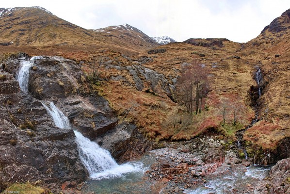 Pass of Glen Coe waterfall
One of the waterfalls at the Pass of Glen Coe, the highest of the three peaks on the left is the most distant one, Stob Dubh, rising to some 958 metres.  [url=http://www.streetmap.co.uk/map.srf?X=220664&Y=783018&A=Y&Z=126&ax=220704&ay=783078/] Map location. [/url]
