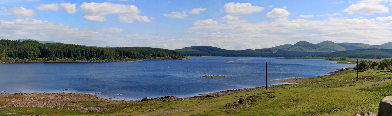 Loch Doon
In the 1930's a Dam was built that raised the water level of Loch Doon by nearly 30ft as part of The Galloway Hydro scheme.  As a result the water levels can vary considerably.  On the far shore on the left hand side the remains of a tramway can be seen.  This was constructed during WWI when Loch Doon was used as an Aerial gunnery training area. [url=http://streetmap.co.uk/map.srf?X=247487&Y=599348&A=Y&Z=126/] Map location. [/url]

