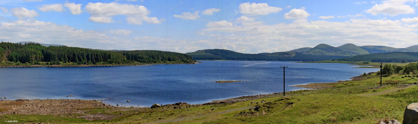 Loch Doon
In the 1930's a Dam was built that raised the water level of Loch Doon by nearly 30ft as part of The Galloway Hydro scheme.  As a result the water levels can vary considerably.  On the far shore on the left hand side the remains of a tramway can be seen.  This was constructed during WWI when Loch Doon was used as an Aerial gunnery training area. [url=http://streetmap.co.uk/map.srf?X=247487&Y=599348&A=Y&Z=126/] Map location. [/url]
