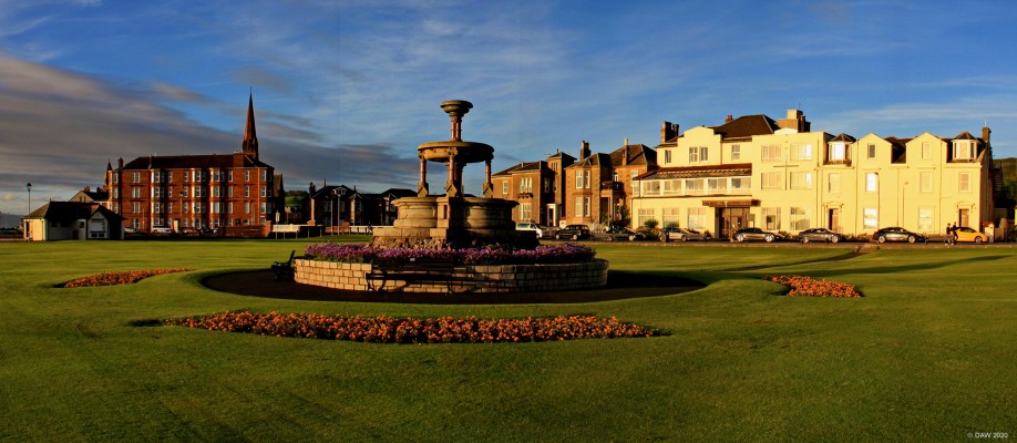 Mackerston Fountain, Largs
The low evening sun at Mackerston.  The cream coloured building in the background was formerly the Mackerston Hotel but is now a Benedictine Monastery.  The grass around the foundtain is Mackerston putting green. [url=http://streetmap.co.uk/map.srf?X=220172&Y=658967&A=Y&Z=110/] Map location. [/url]
